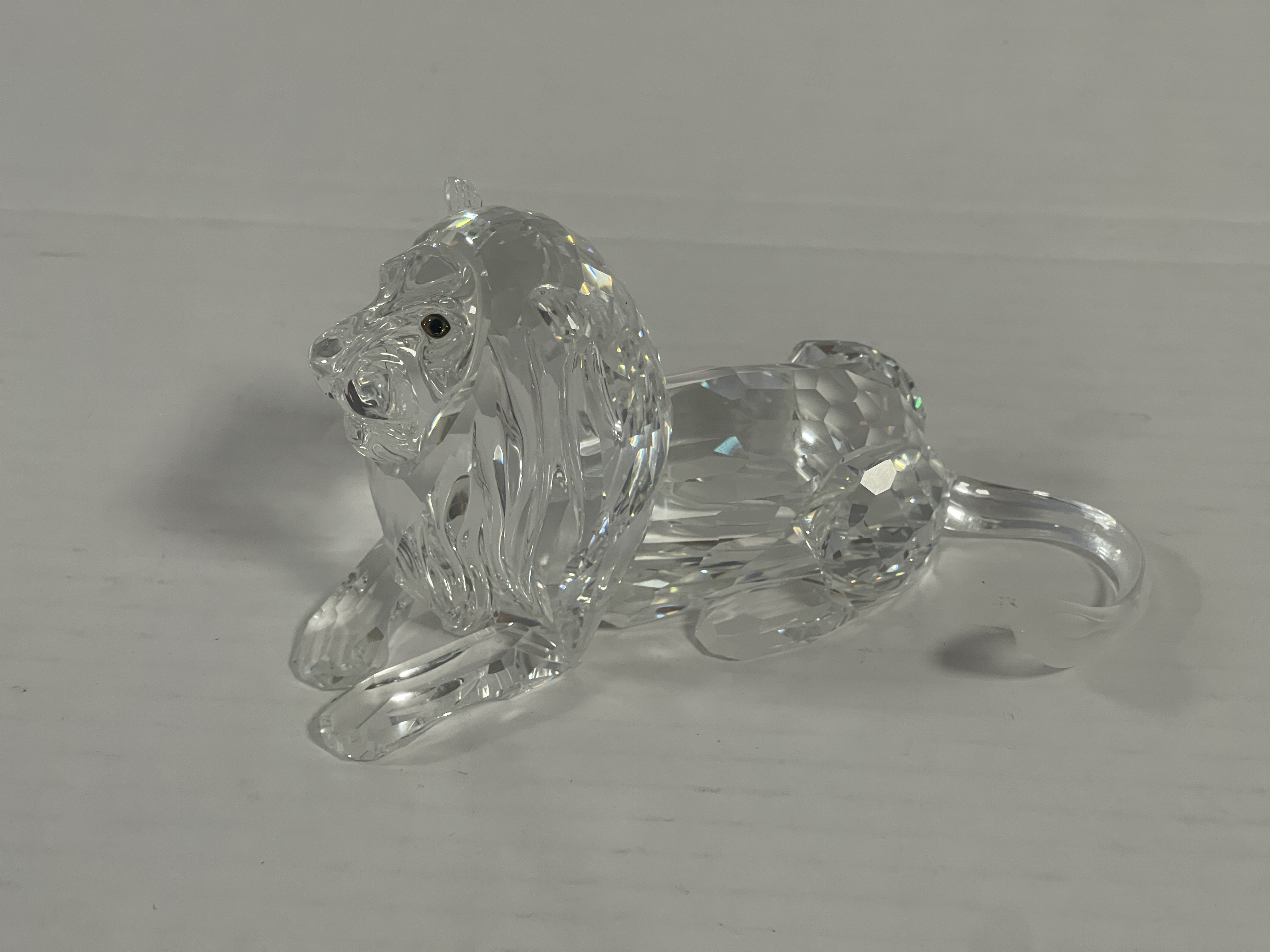  Swarovski Figur 185410 Jahresfigur Löwe 13 cm. Am Schwanz geklebt 