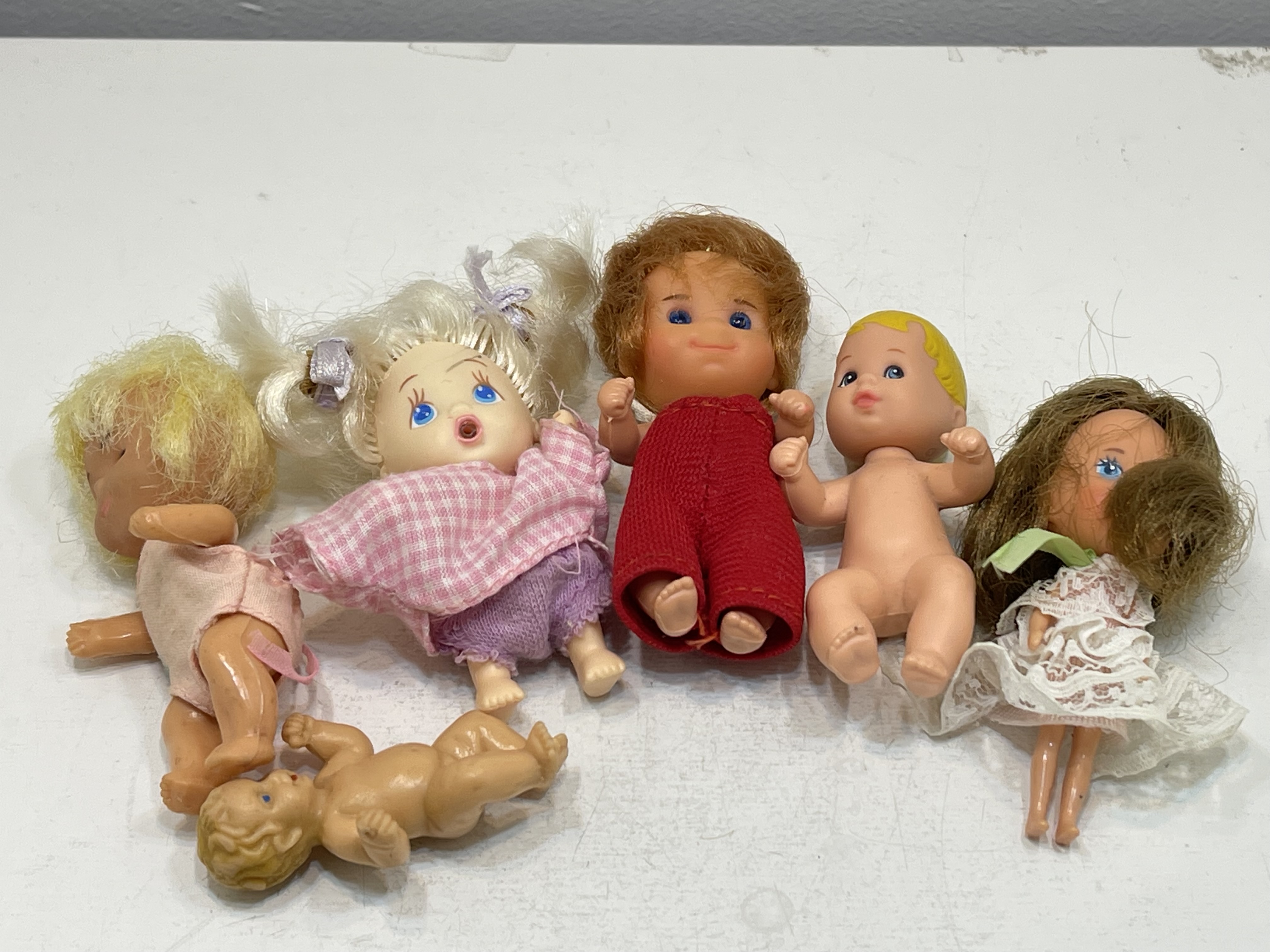 Sammler Vinyl Puppe 6 Stück 5 - 8 cm. Zustand siehe Fotos 