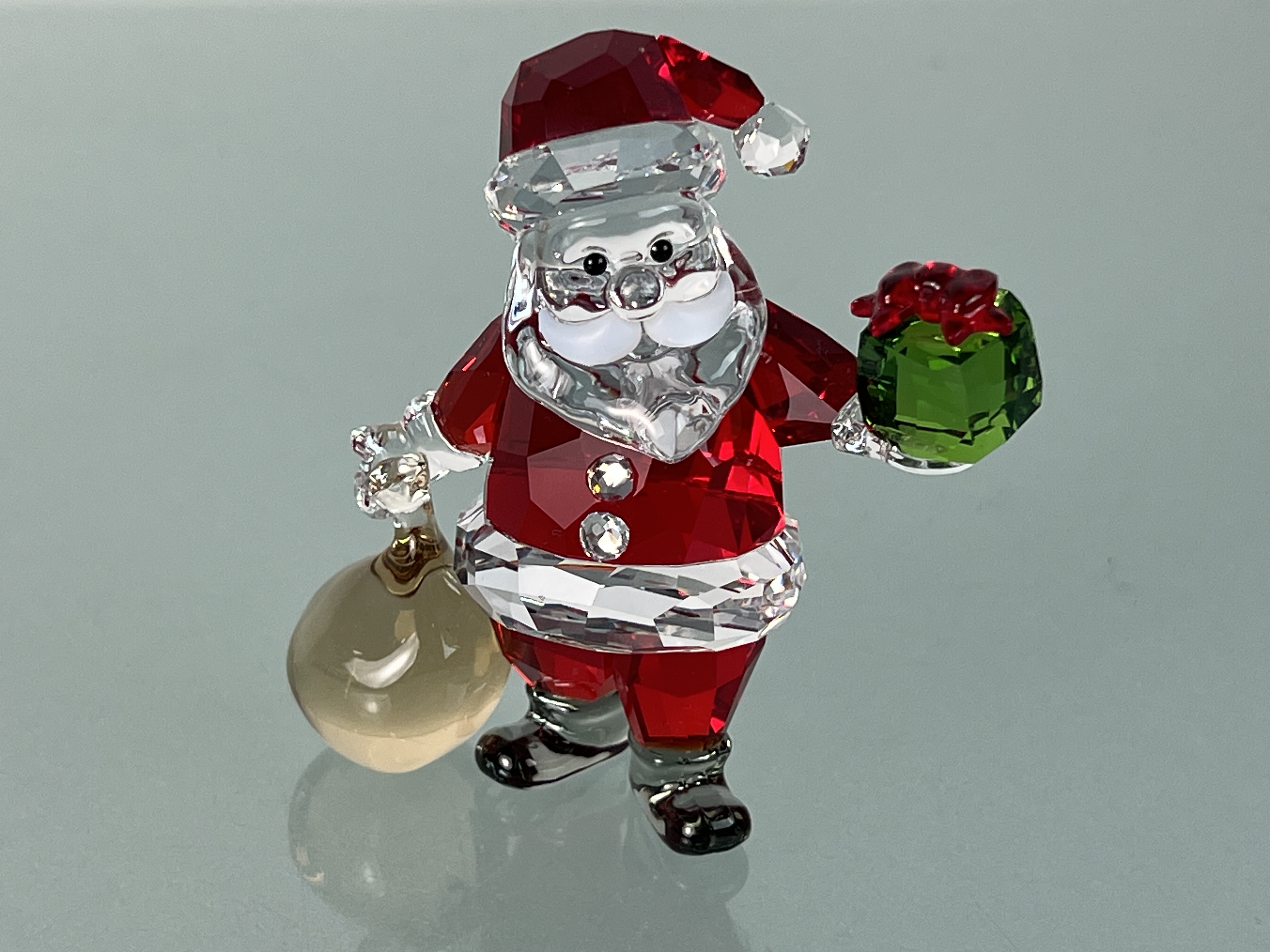 Swarovski Figur 5539365 Weihnachtsmann mit Geschenkesack 7,1 cm. Top Zustand