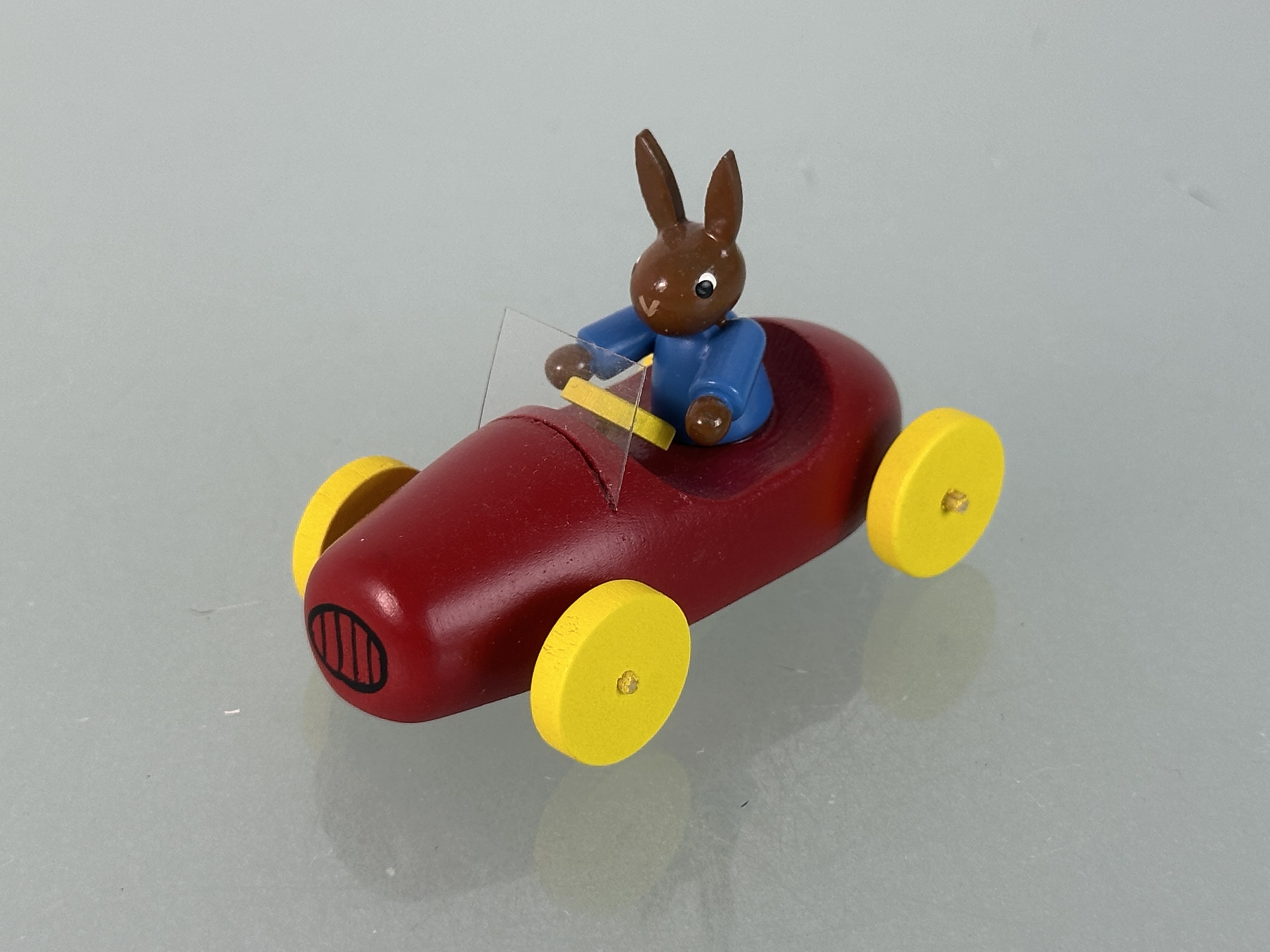 Erzgebirge Seiffener Figur Hase mit Auto 4,5 x 6,7 cm. Top Zustand