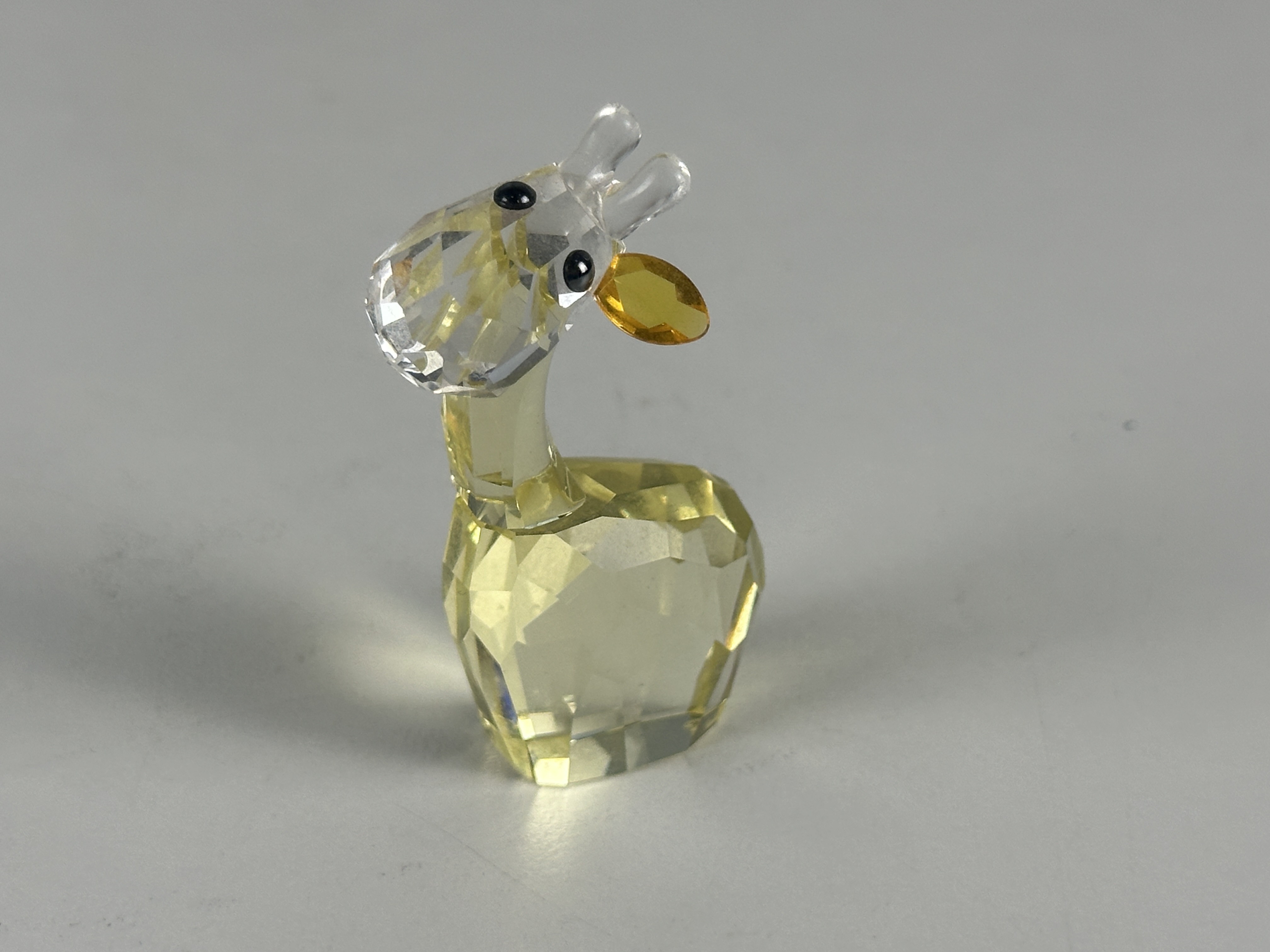 Swarovski Figur 5004632 Giraffe chat 6 cm. Zustand siehe Fotos