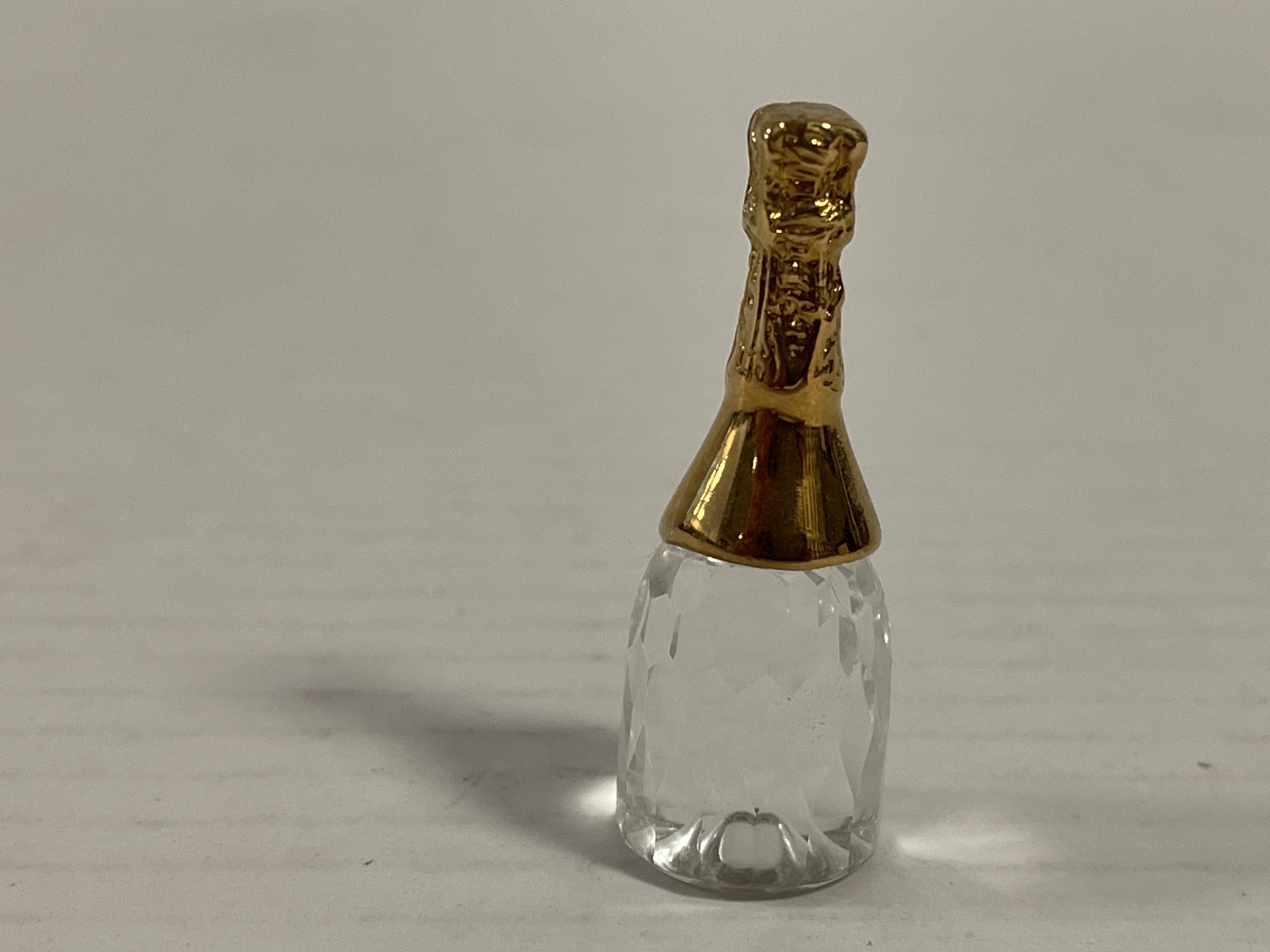 Swarovski Figur 208887 Sektflasche 4,7 cm. Top Zustand.  
