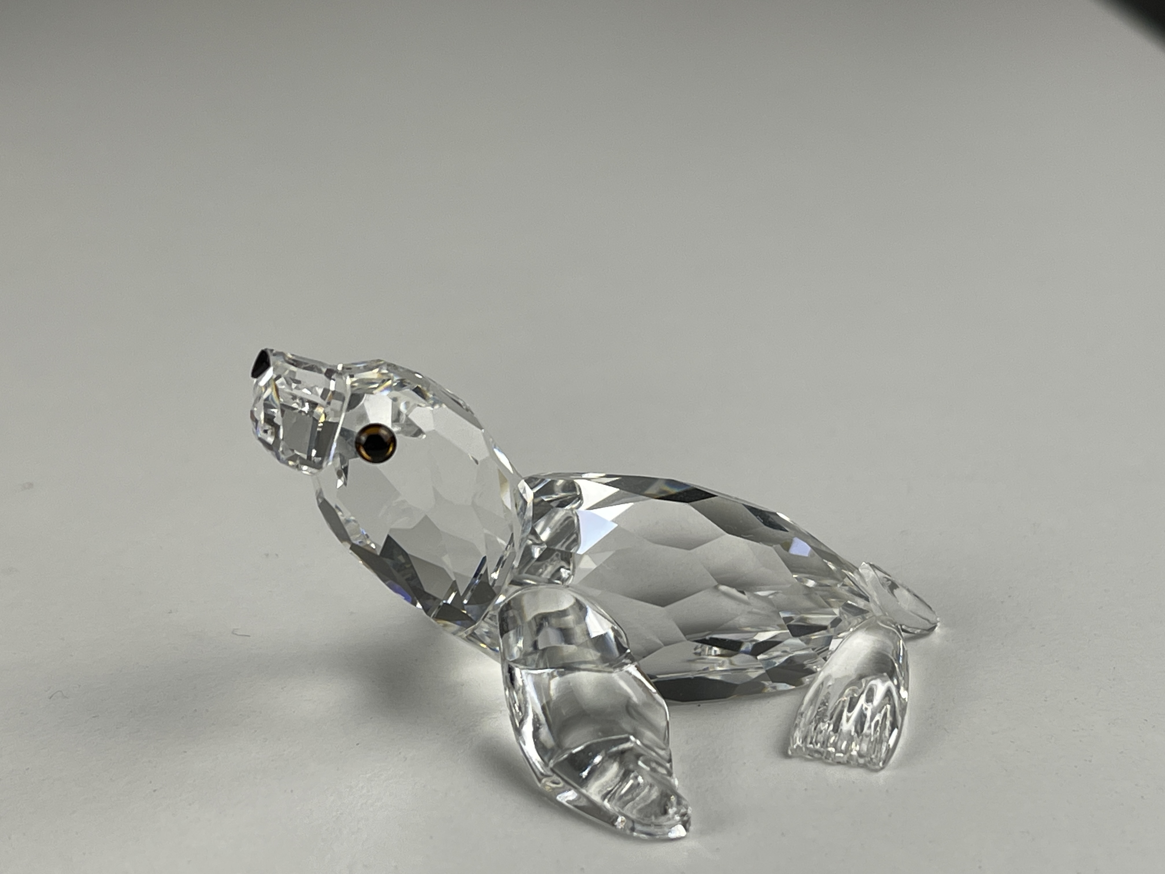 Swarovski Figur 221120 Seehund / Robbe 5,5 cm.  Zustand siehe Fotos  